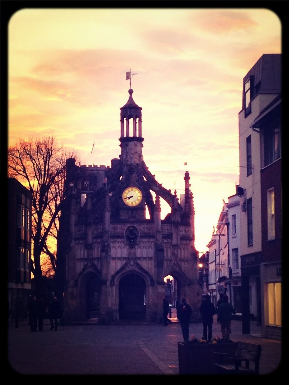 architecture, building exterior, built structure, sky, transfer print, sunset, church, religion, place of worship, auto post production filter, street, city, cloud - sky, clock tower, spirituality, facade, car, cloud