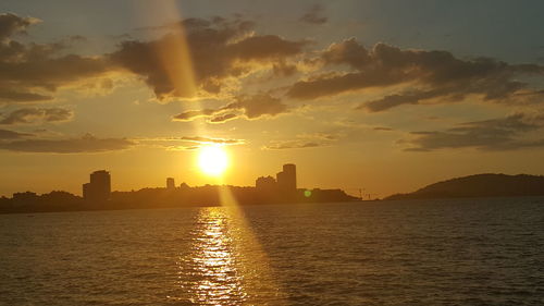 Scenic view of sunset over river