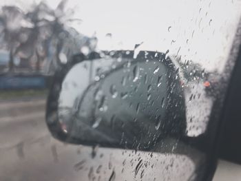 Close-up of raindrops on car window