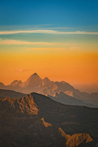 Vertical mountain panorama with orange filter