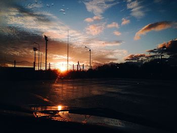 Silhouette of city at sunset