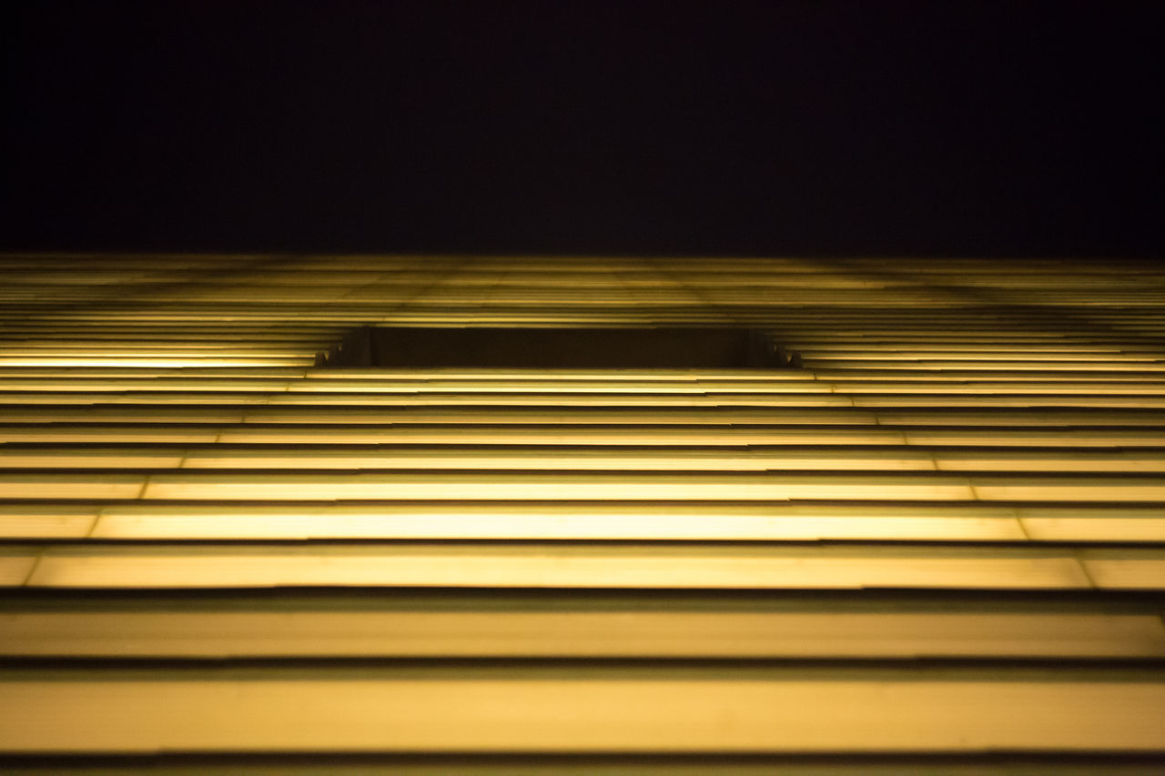 LOW ANGLE VIEW OF ILLUMINATED LIGHT BULBS