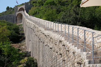 Kula stovis at the top and town walls, ston, croatia 2018