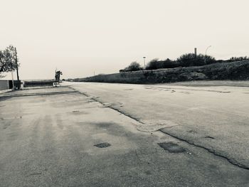 Scenic view of landscape against clear sky during winter