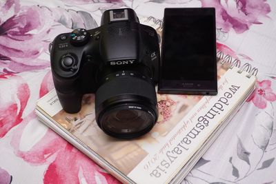 High angle view of camera on table