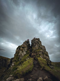 Rock formations on landscape against sky