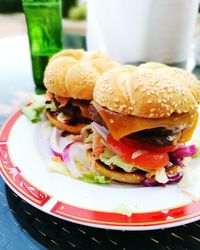 Close-up of burger in plate on table