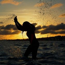 Scenic view of sea at sunset