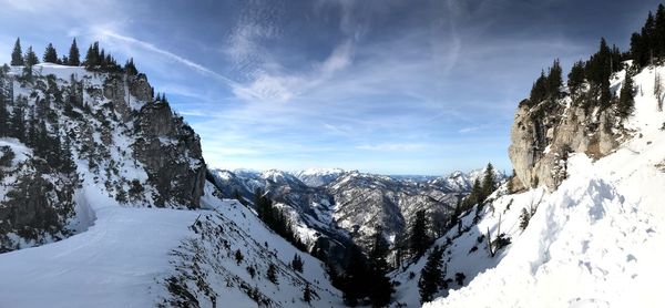 Scenic view of snowcapped mountains against sky