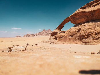 Scenic view of desert against clear sky