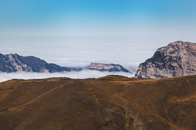 Scenic view of snowcapped mountains against sky