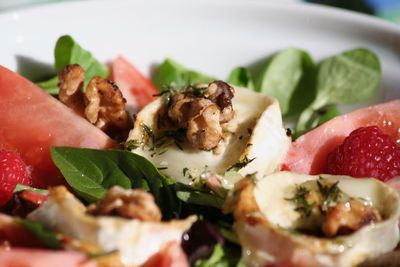 Close-up of chopped fruit salad in plate