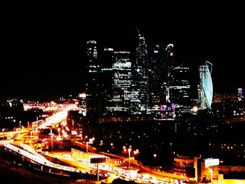 Illuminated cityscape at night