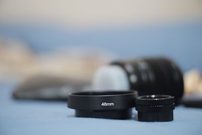 Close-up of camera lens on table