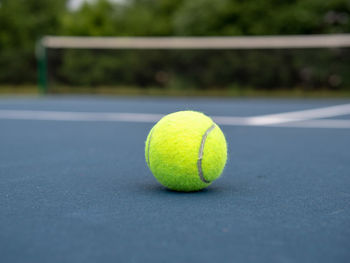 Close-up of green ball on table