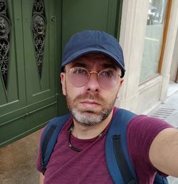 Portrait of young man standing outdoors