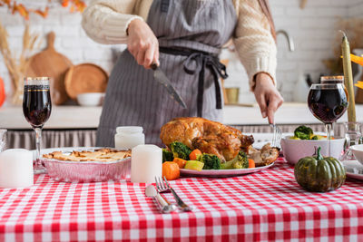 Happy thanksgiving day. autumn feast. woman celebrating holiday cooking traditional dinner 