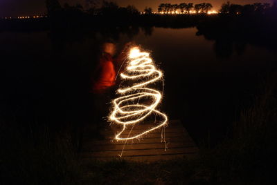 Person dancing at night