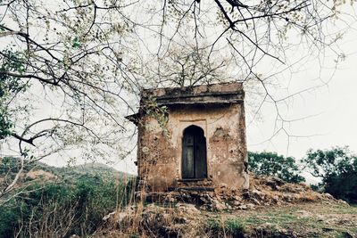 Abandoned building against sky