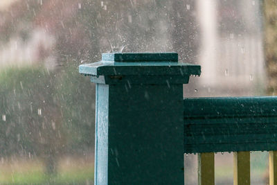 Close-up of wet metal during rainy season