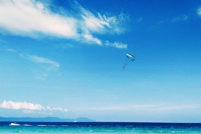 Scenic view of sea against blue sky