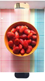 Close-up of strawberries in plate on table