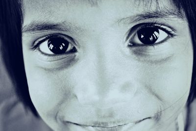 Close-up portrait of smiling girl