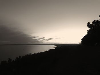 Scenic view of sea against sky at sunset