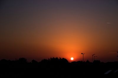 Silhouette of trees at sunset