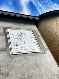 Low angle view of built structure against blue sky