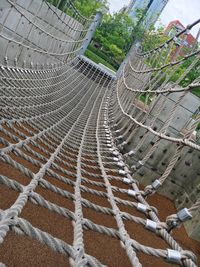 Close-up of net against sky