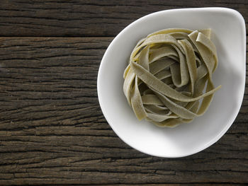 Close-up of tagliatelle pasta on table