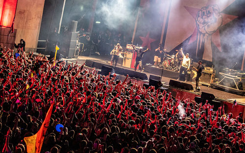 Crowd at music concert at night