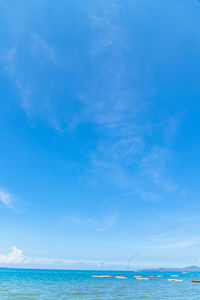 Scenic view of sea against blue sky