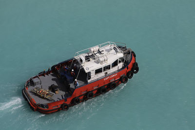 High angle view of ship sailing in sea