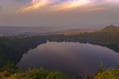 Scenic view of landscape against sky during sunset