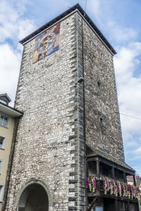 Low angle view of old building against sky