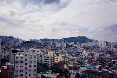 High angle shot of townscape against sky