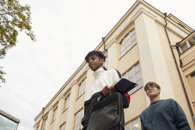 Low angle view of teenage boys