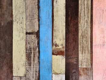 Full frame background of old colorful wooden plank wall