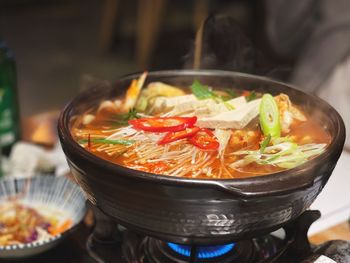 Close-up of fish soup on a fire