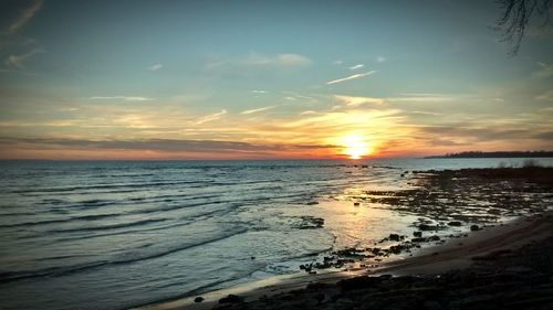 Scenic view of sea at sunset