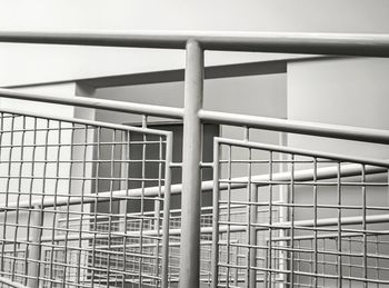 Low angle view of railing against sky