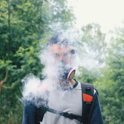 Close-up of man smoking cigarette