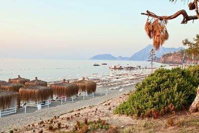 Panoramic view of beach against clear sky