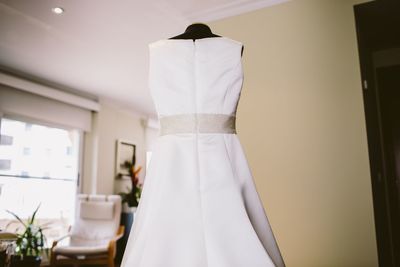 Wedding dress on mannequin at home