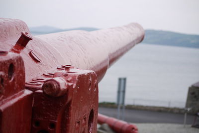 Cannon on dunree fort against sea