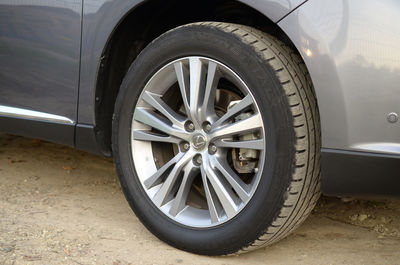 Close-up of wheel on field