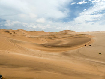 Scenic view of desert against sky