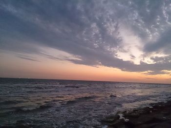 Scenic view of sea at sunset